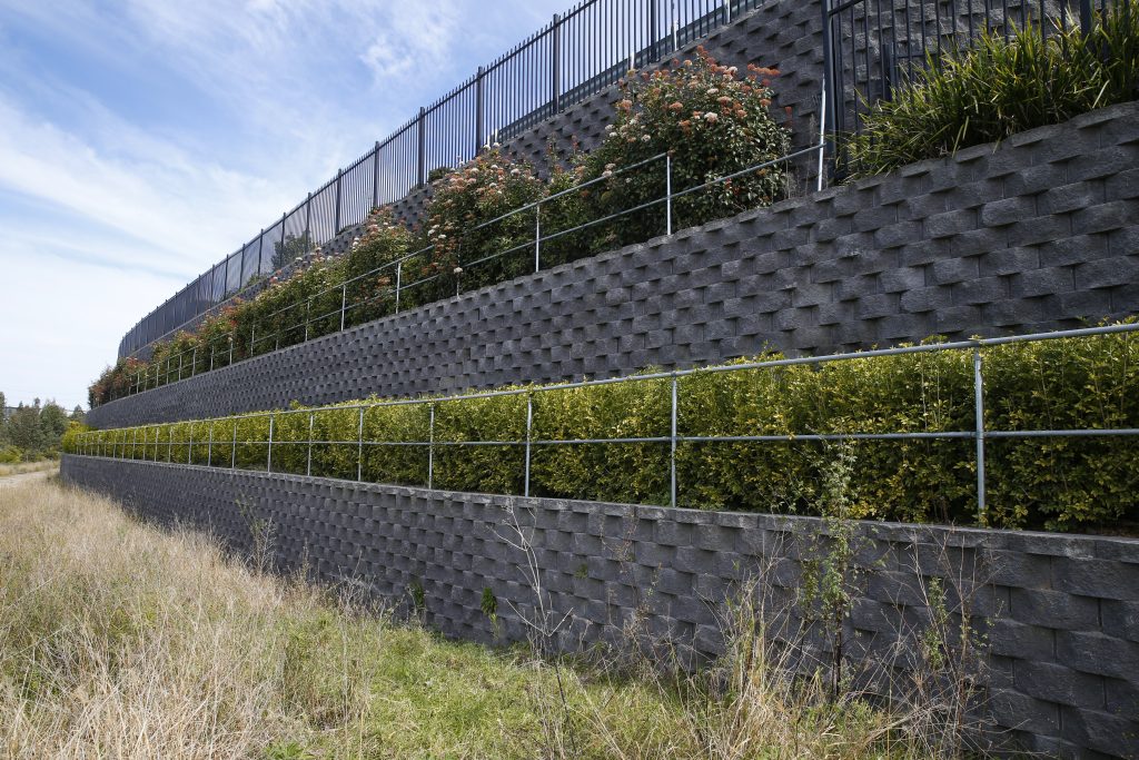 Modular retaining wall at the Fisher and Paykel distribution warehouse at Eastern Creek Business Park. Civil and structural engineering by Costin Roe Consulting.
