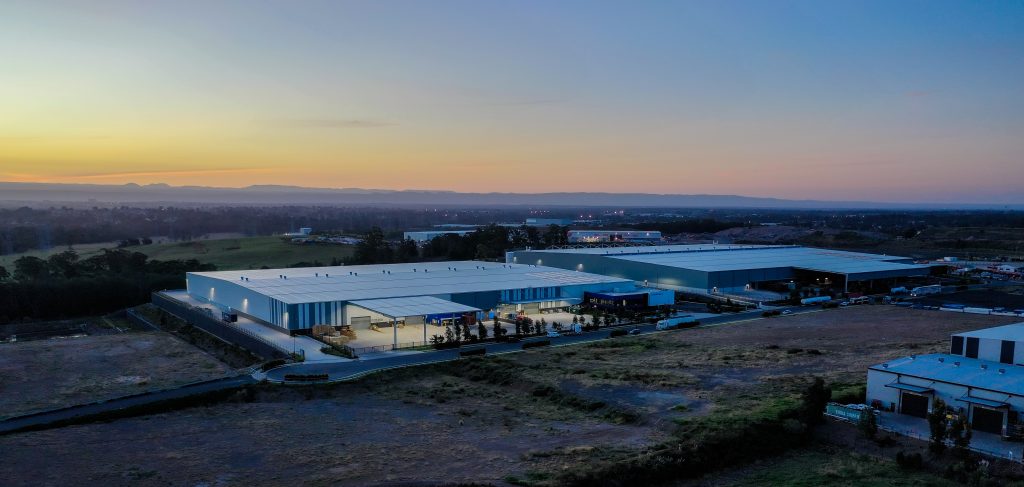 Dusk over the Rhino Rack warehouse facility at Eastern Creek Business Park. Civil and structural engineering by Costin Roe Consulting.