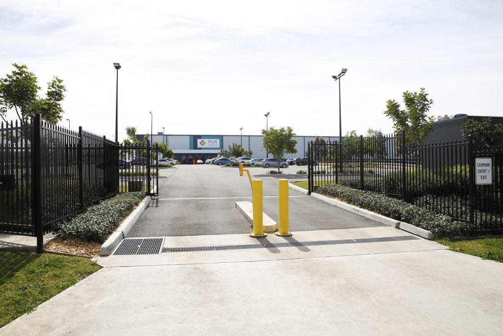Driveway entrance to Silk Contract distribution facility at Eastern Creek Business Park. Civil and structural engineering by Costin Roe Consulting.