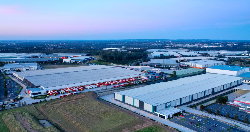 Aerial sunset over Silk Contract warehouse at Eastern Creek Business Park. Civil and structural engineering by Costin Roe Consulting.